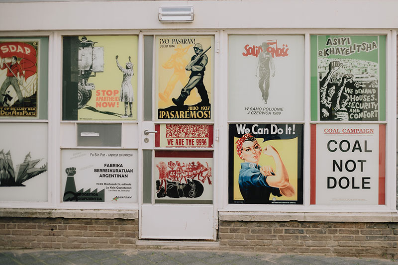 various posters on a wall - poster design